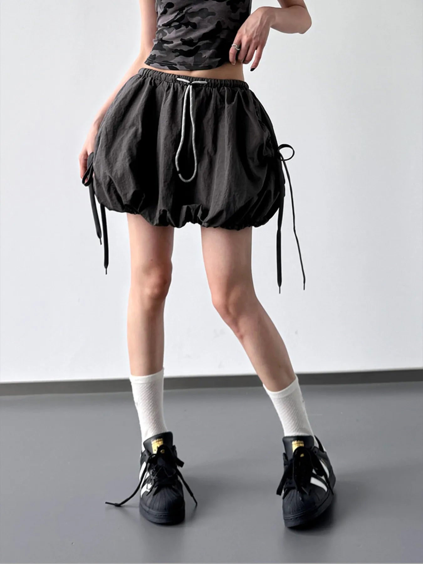 Light blue bubble drawstring casual shorts from Trendsi featuring a relaxed fit and comfortable elastic waistband.