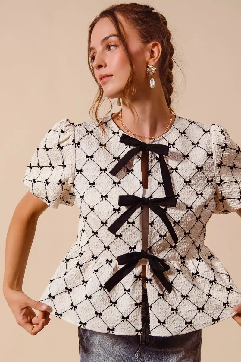 Ivory SO ME woven peplum top with bow texture and contrast tie, stylish women's blouse from Trendsi.