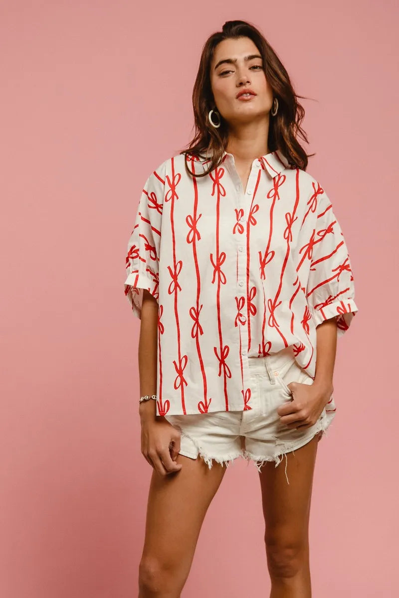 Woven printed button-down shirt with BiBi Bow Ribbon details, in lightweight fabric, featuring a casual fit and trendy design.