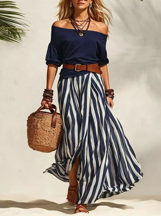Off shoulder top and striped maxi skirt set by Trendsi, featuring a stylish off-shoulder blouse with a long, flowing striped skirt.