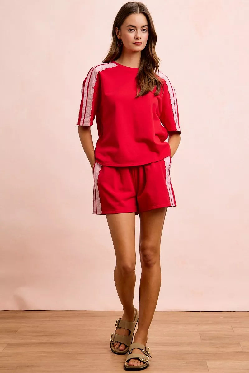 BiBi French Terry short sleeve top with side lace detail, casual and stylish, featuring a relaxed fit and comfortable fabric.
