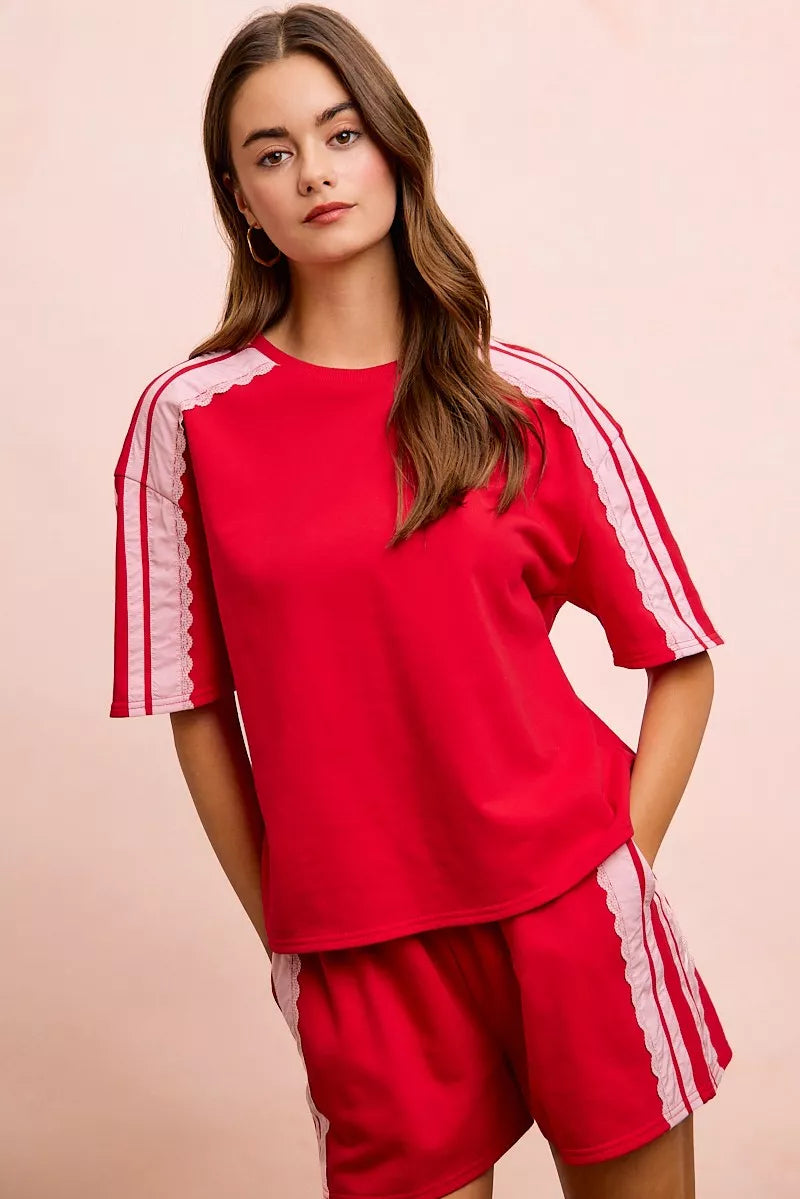 BiBi French Terry short sleeve top by Trendsi with side lace detail, casual style, and comfortable fit.