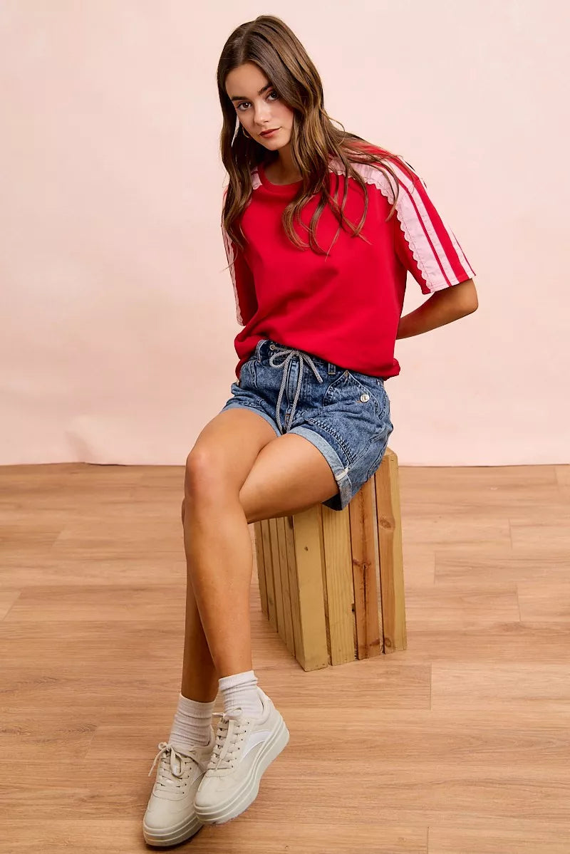BiBi French Terry short sleeve top with side lace detail, casual trendy shirt by Trendsi, shown with fabric texture and side design.