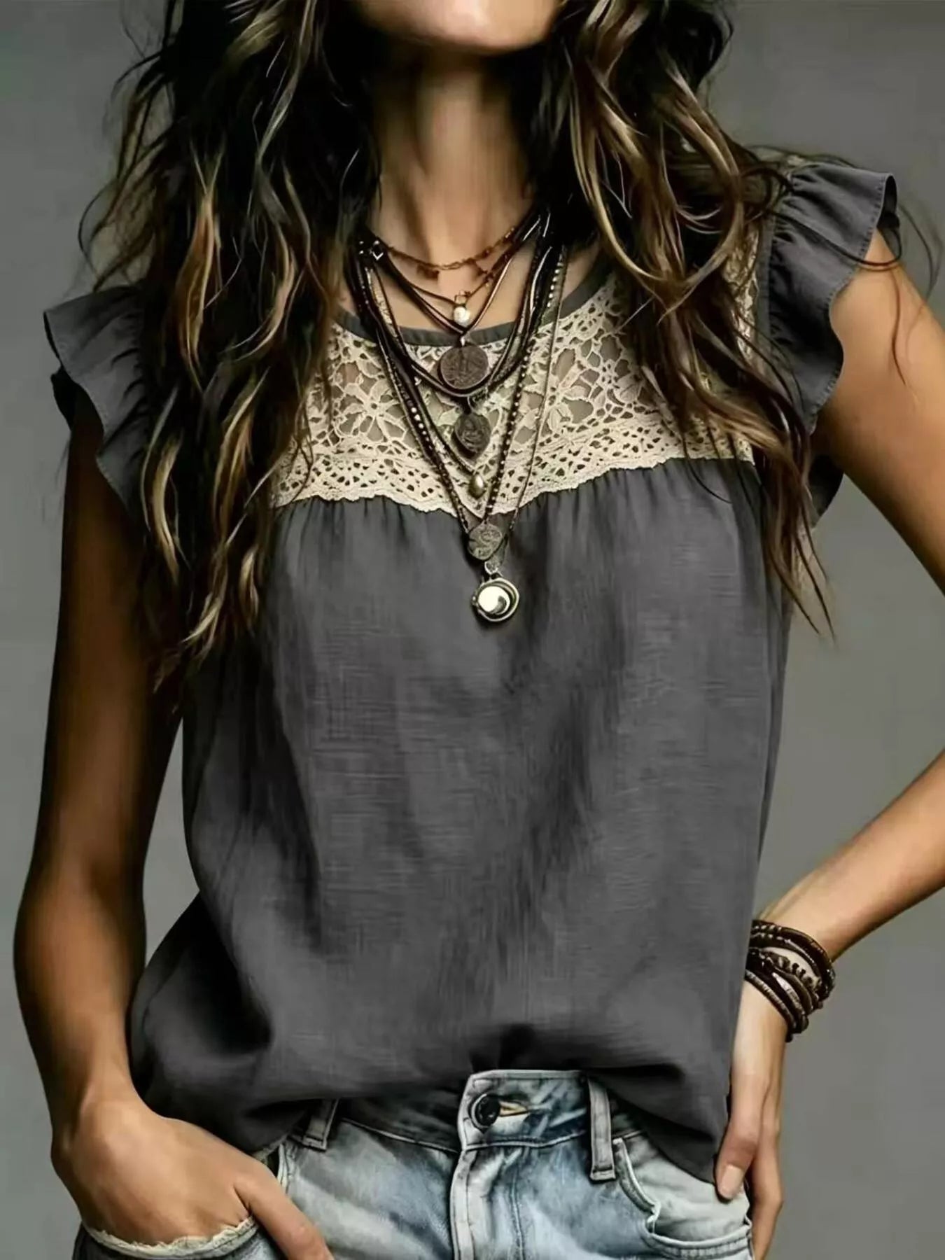 Plus size lace trim ruffle sleeve blouse by Trendsi, featuring delicate lace details and feminine ruffle sleeves.