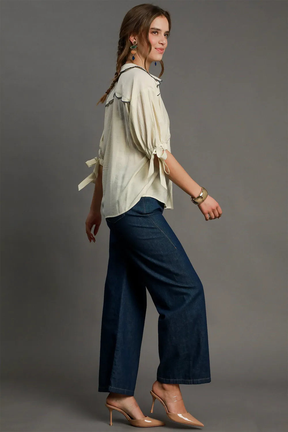 Plus size Umgee embroidered button-down shirt with detailed floral embroidery, casual long-sleeve top for women.