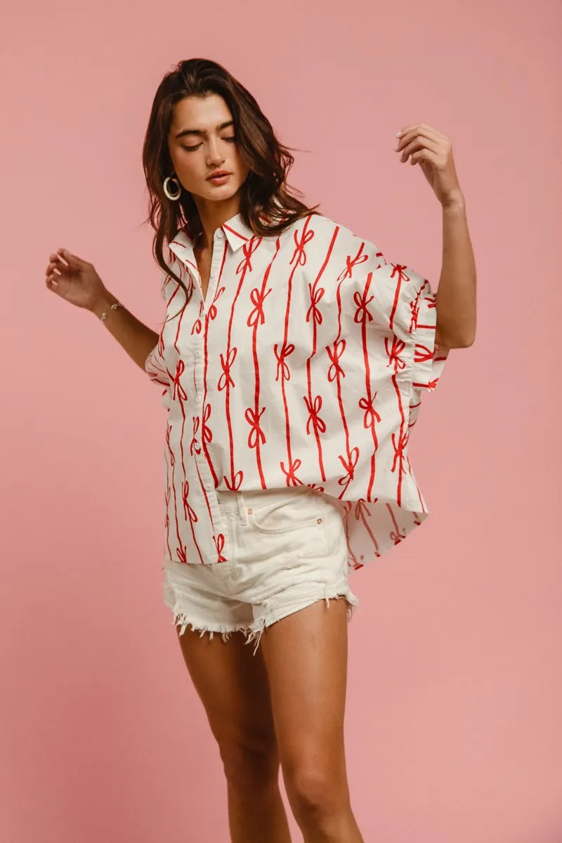 Woven printed button-down shirt from BiBi Bow Ribbon collection by Trendsi, featuring a colorful woven pattern and classic collar.
