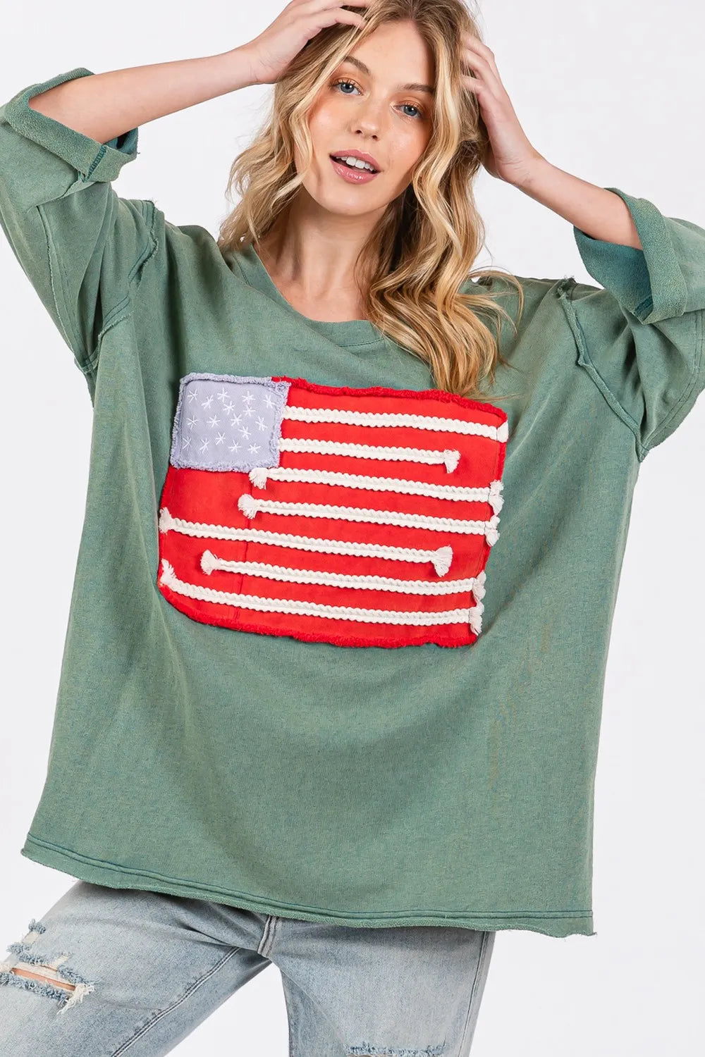 SAGE + FIG American flag patch drop shoulder T-shirt by Trendsi, featuring a full-size flag design on a casual shirt.