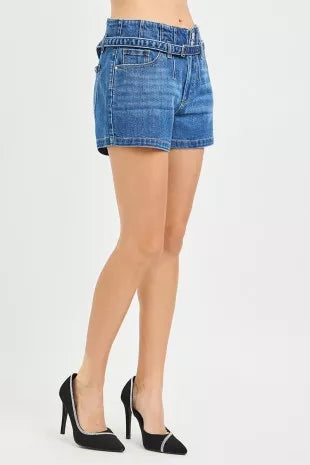 Risen slouchy denim shorts with belt, featuring a relaxed fit and casual style, displayed on a mannequin.