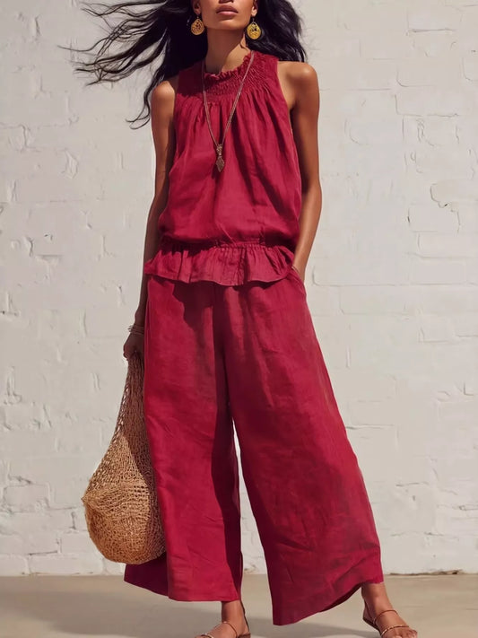 Trendsi smocked ruffled hem top with wide-leg pants set, featuring floral print, lightweight fabric, and feminine ruffle details.