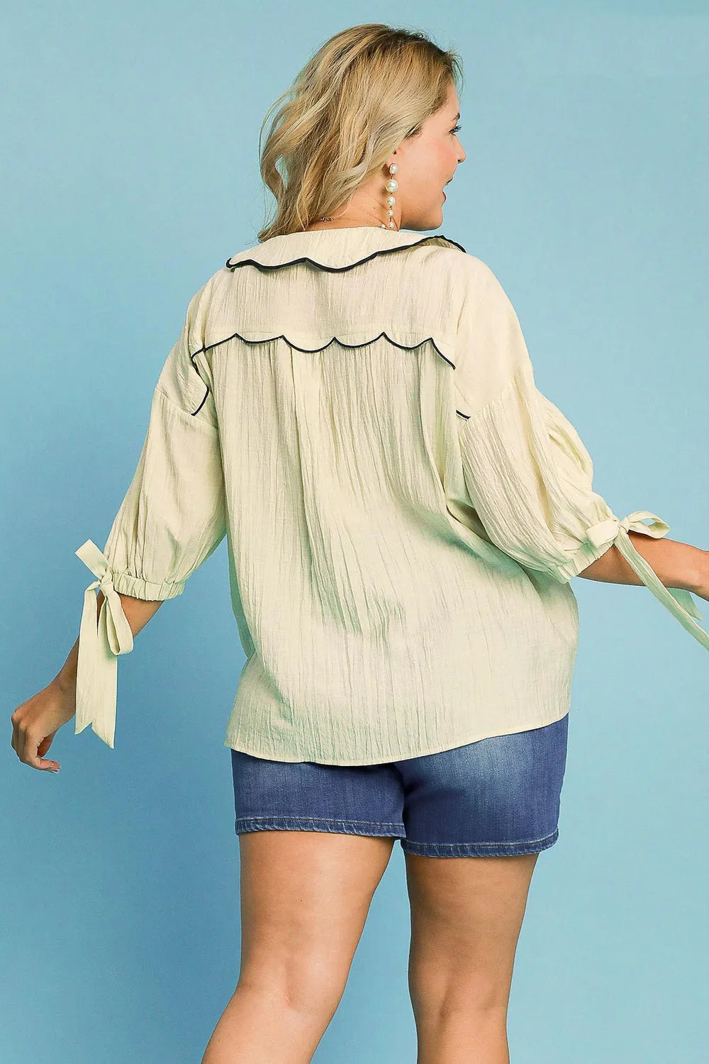 Plus size Umgee embroidered button-down shirt featuring detailed embroidery and a relaxed fit, ideal for casual or layered outfits.