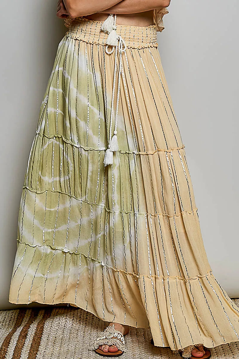 Trendsi POL shimmer tiered maxi skirt with reverse ruffle design and smocked waist, featuring a flowing, layered silhouette.