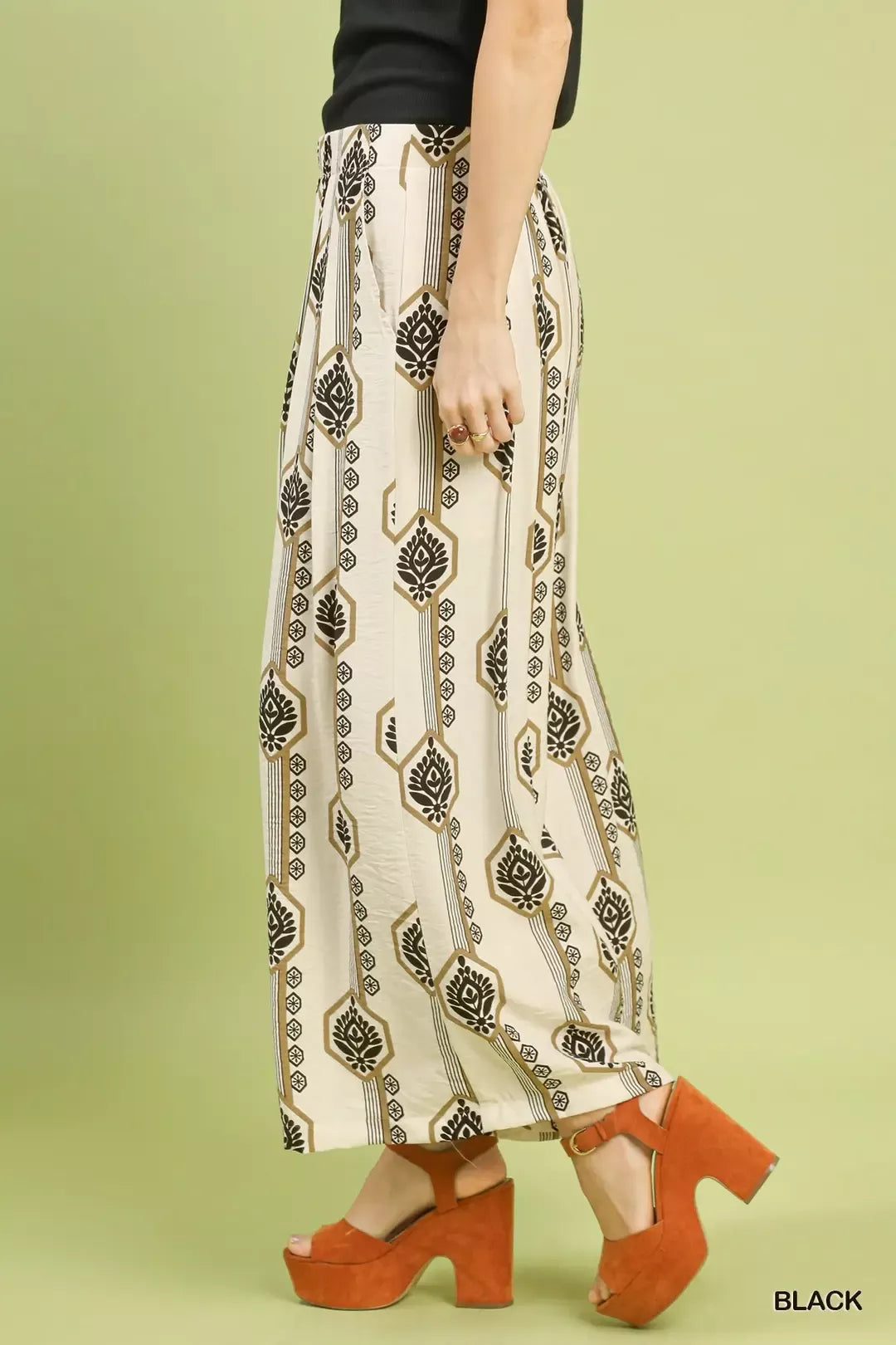 Umgee geometric boho print wide-leg pants with relaxed fit and stylish pattern, perfect for casual and bohemian looks.