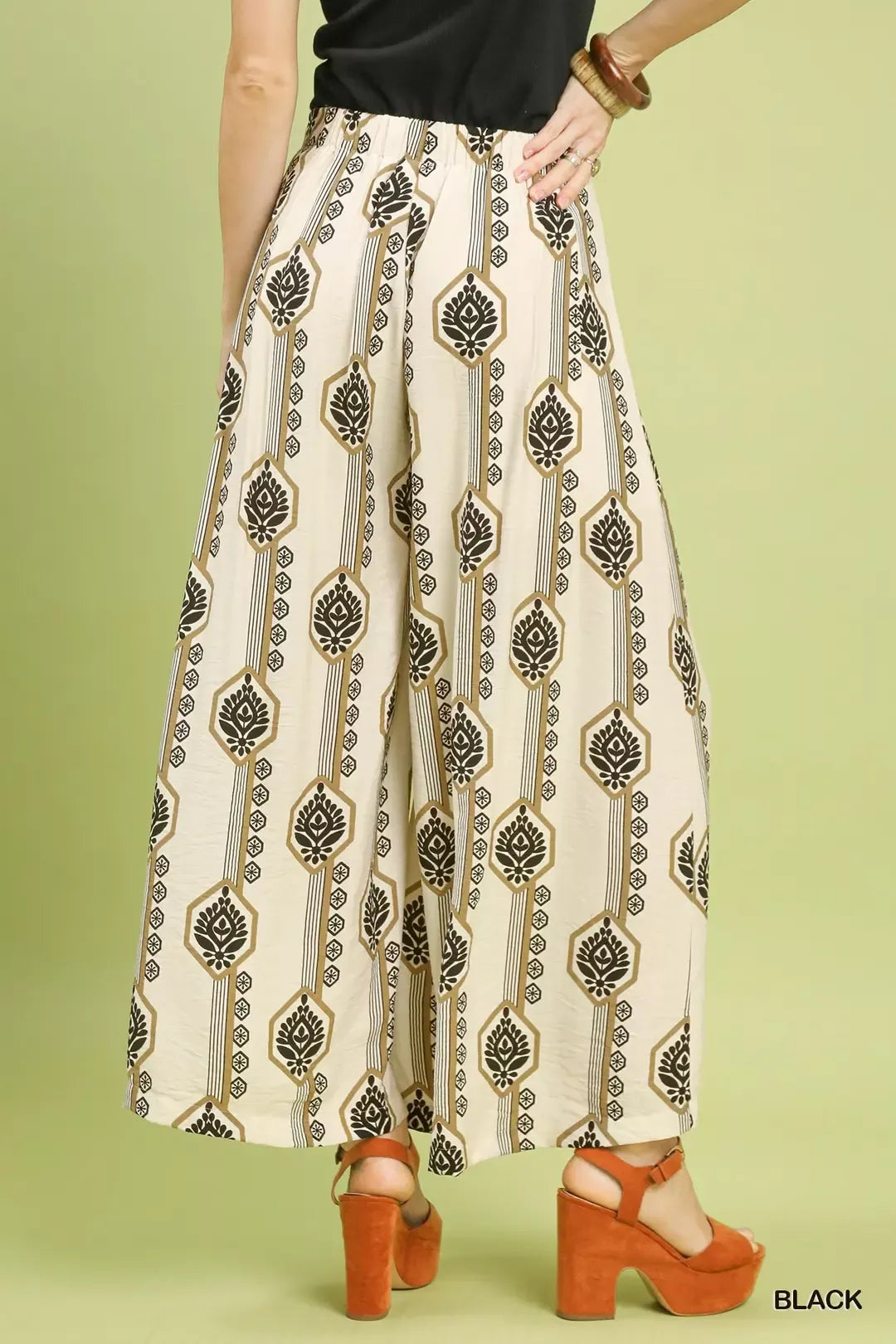Umgee Geometric Boho Print wide-leg pants with a relaxed fit and bold geometric design, perfect for casual and boho styles.