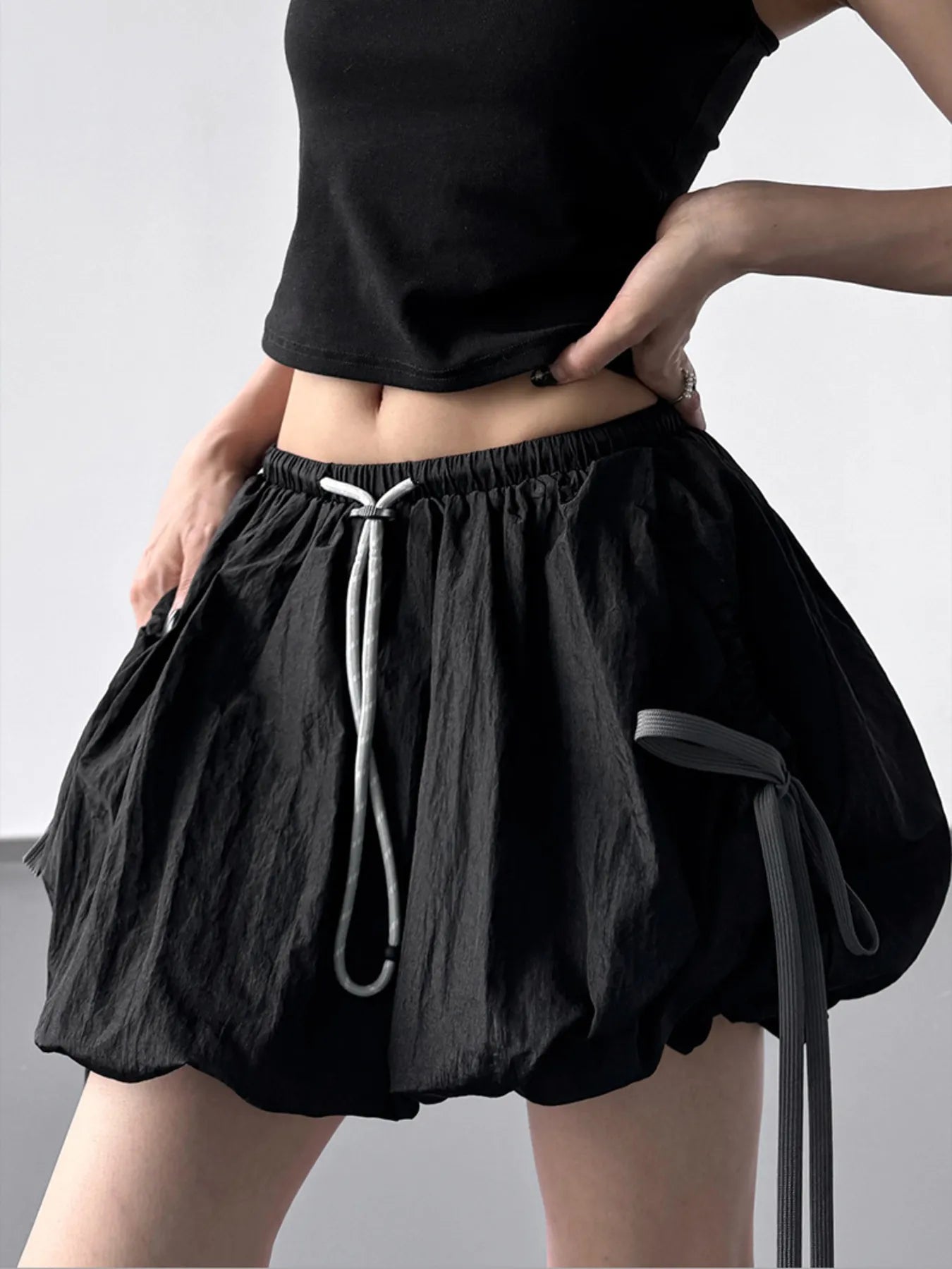 Casual Bubble Drawstring Shorts in neutral color, featuring a relaxed fit and comfortable elastic waistband, by Trendsi.