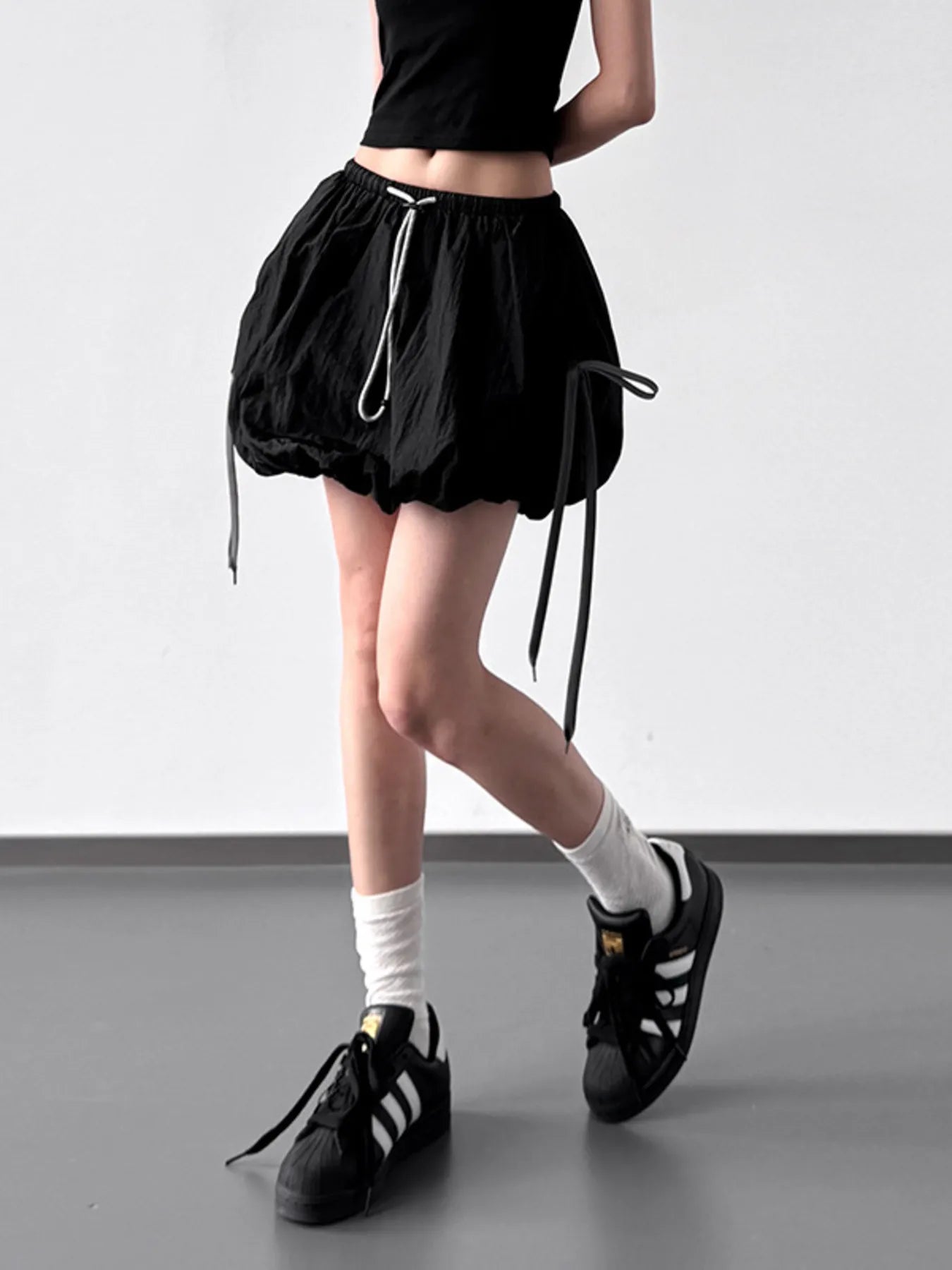 Casual Bubble Drawstring Shorts by Trendsi, featuring a relaxed fit with a drawstring waist and lightweight fabric.