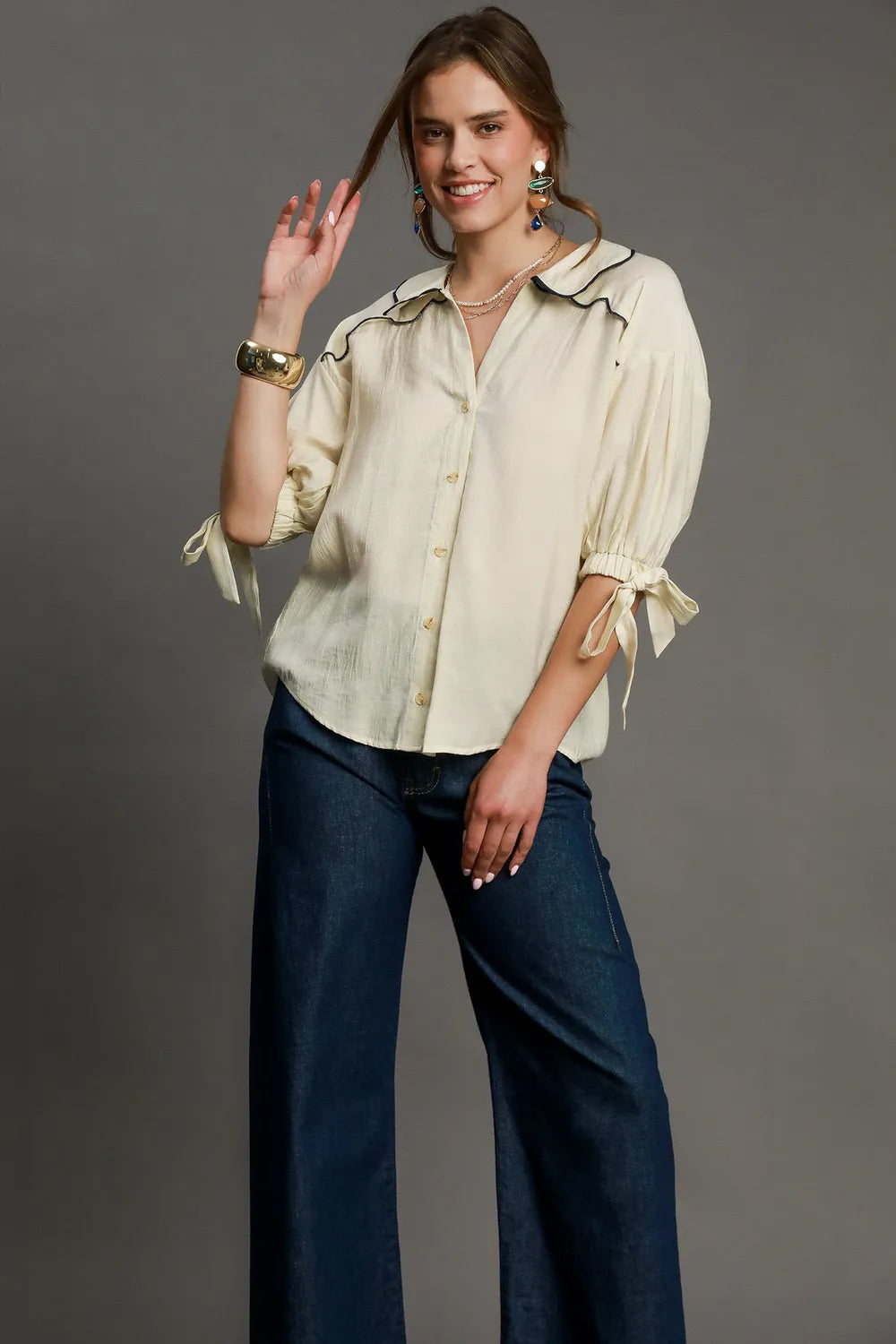 Plus size Umgee embroidered detail button-down shirt featuring intricate embroidery and a relaxed fit, perfect for casual wear.