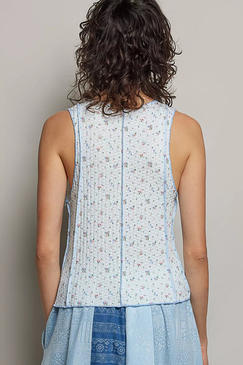 Blue multi-color floral POL seam detail ribbed tank top with round neck from Trendsi, showcasing its textured fabric and fitted design.