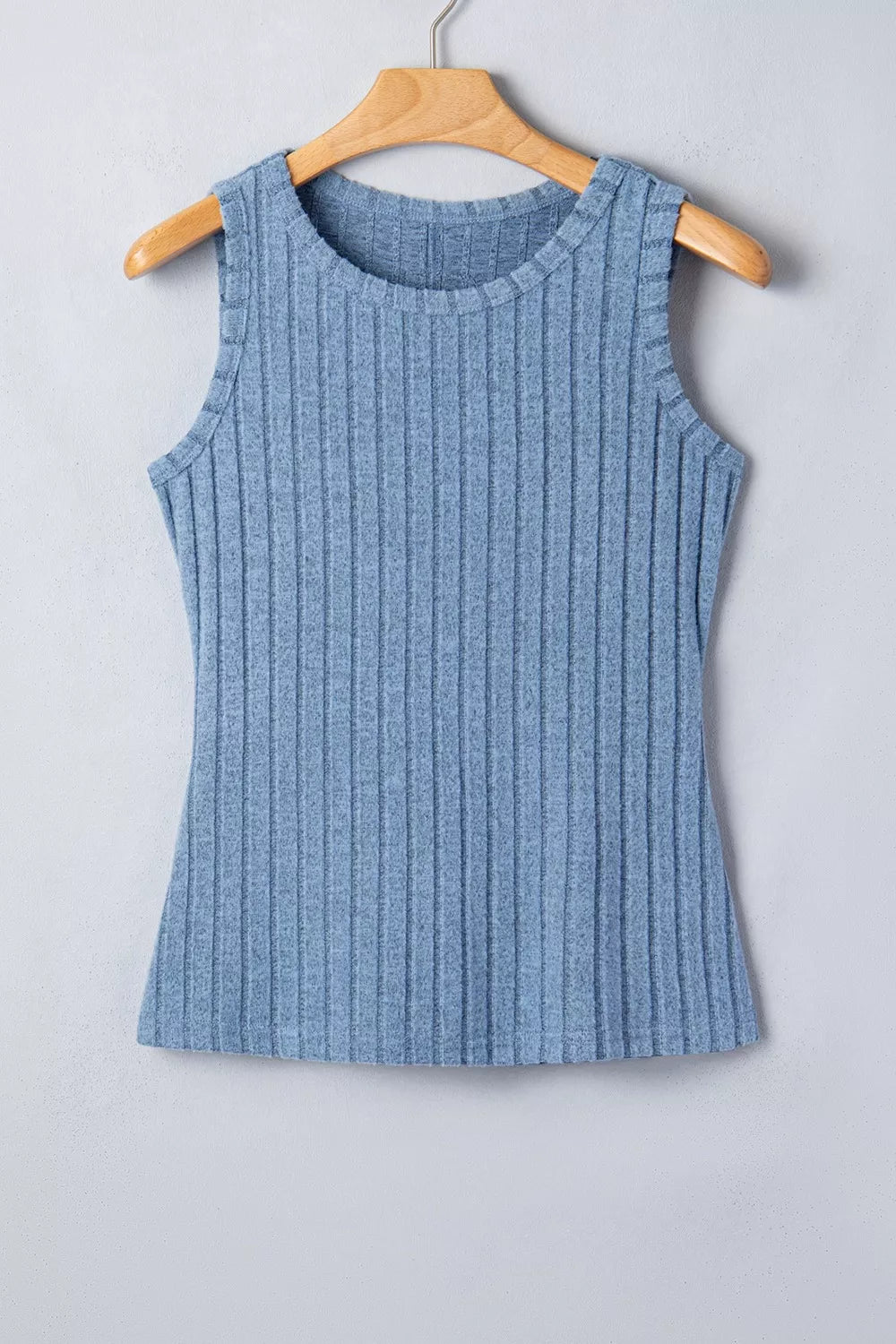 Dusty blue slim ribbed mineral wash tank top from Trendsi, showing close-up of fitted sleeveless design and textured fabric.