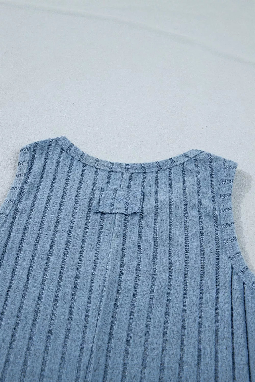 Dusty blue Slim Ribbed Mineral Wash Tank Top by Trendsi, showing the fitted ribbed design and soft fabric texture.