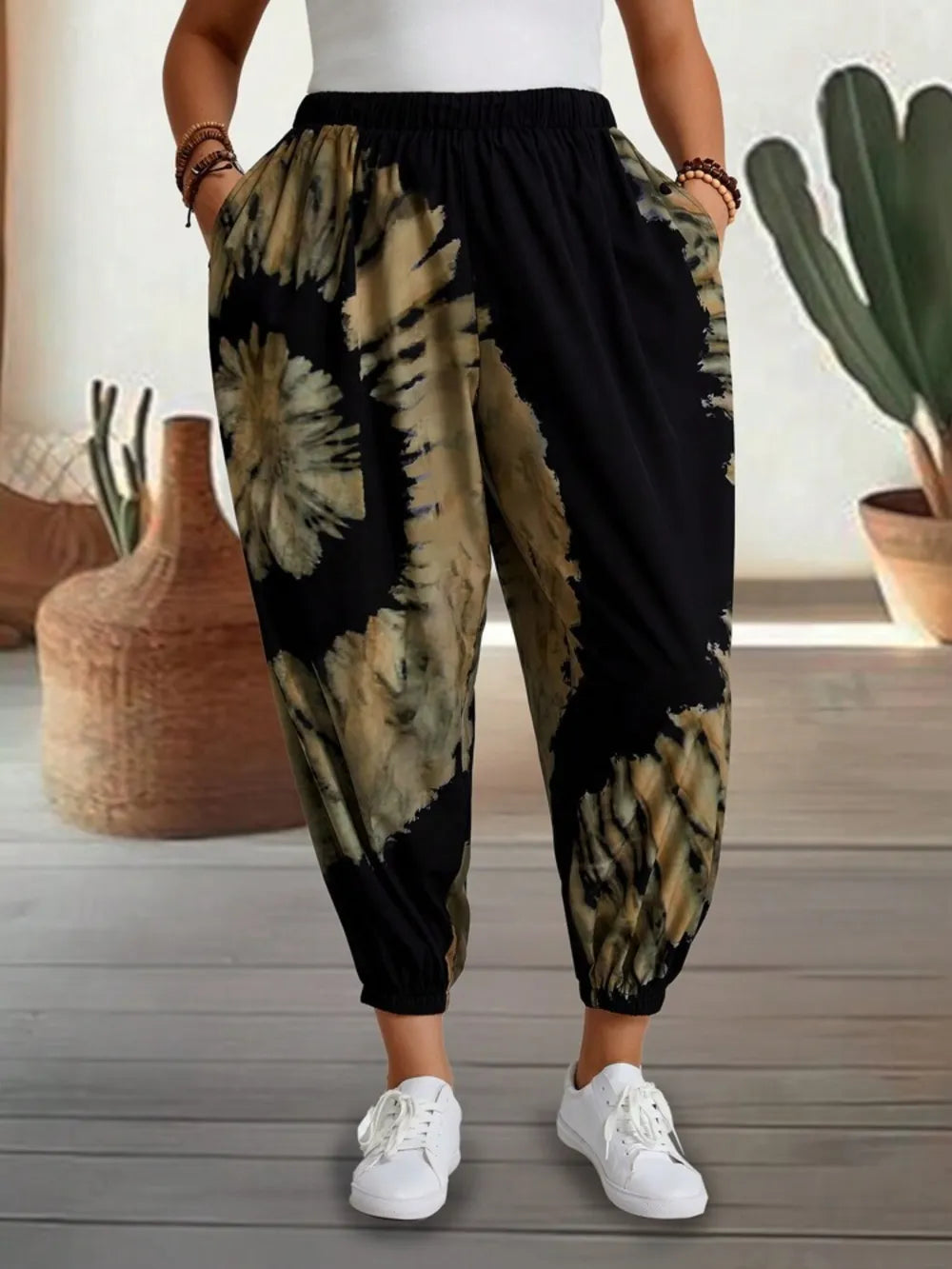 Dusty pink tie-dye elastic waist pants from Trendsi, featuring a relaxed fit and comfortable stretch fabric.