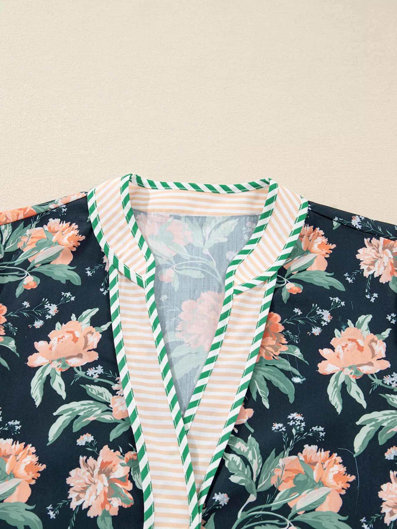 Floral print striped trim V-neck long sleeve shift mini dress with ruffle hem, by Trendsi, casual and stylish for warm weather.
