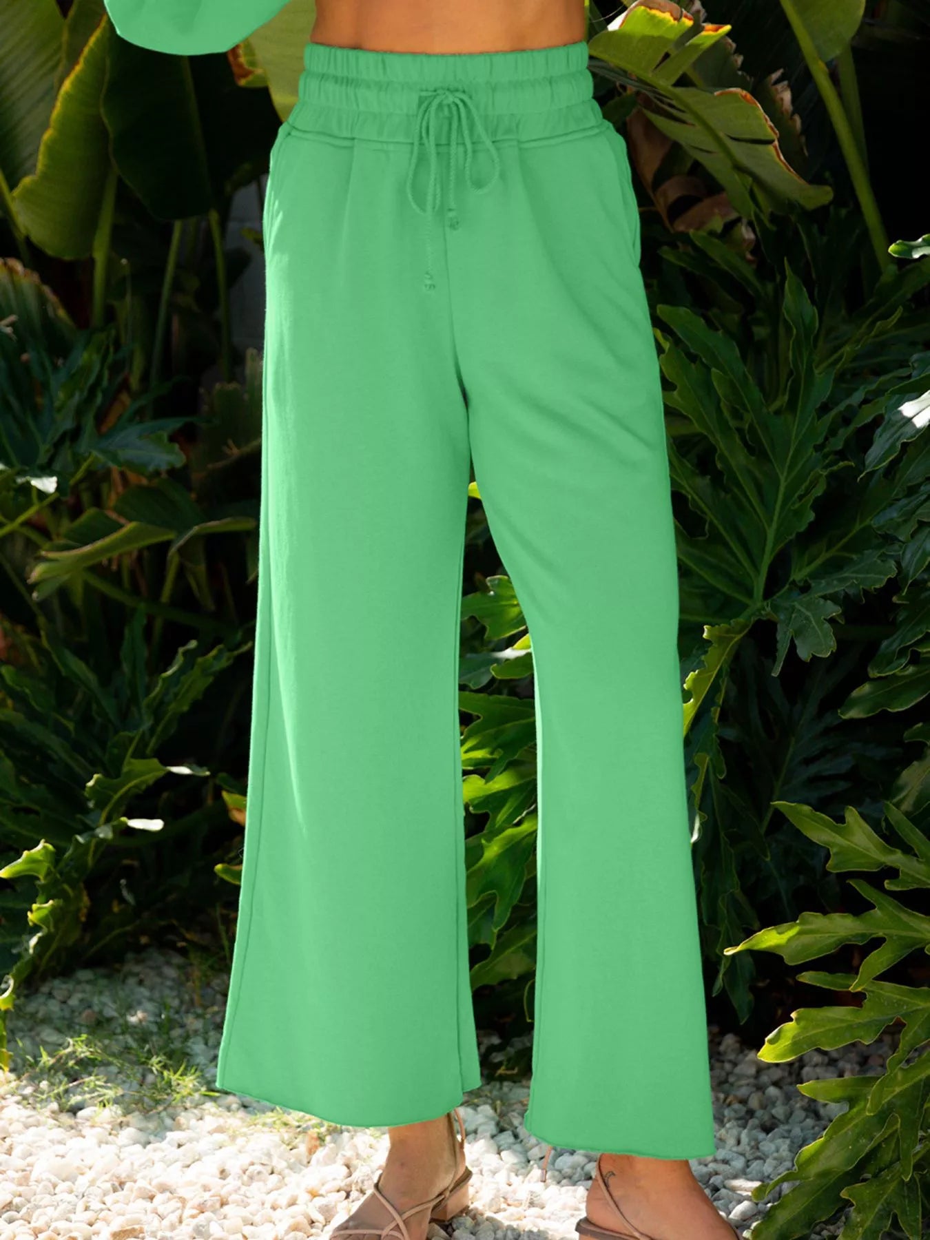 Green drop shoulder puff sleeve crop top and drawstring wide-leg pants set by Trendsi, casual and stylish outfit.