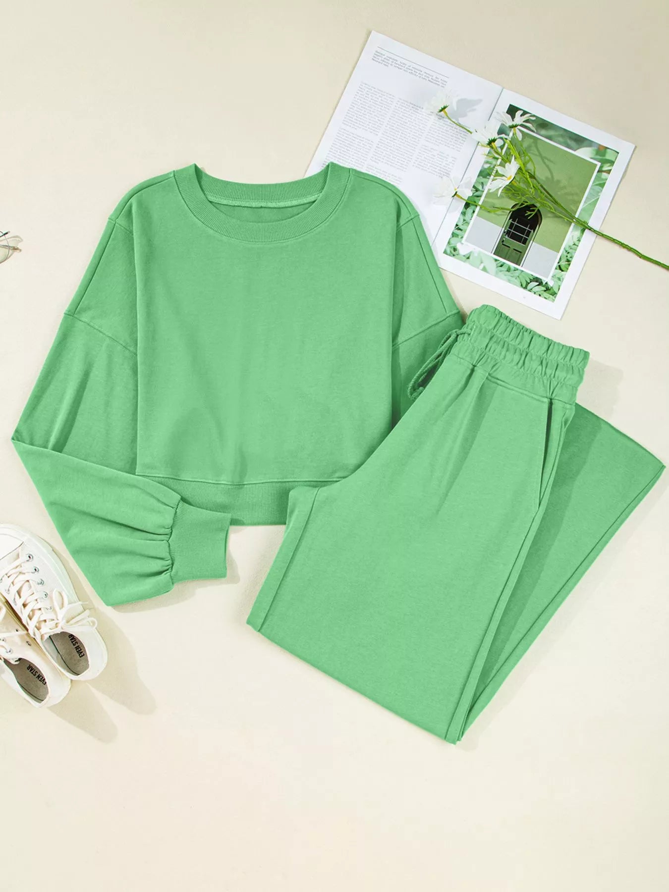 Green drop shoulder puff sleeve crop top with matching drawstring wide leg pants set by Trendsi, stylish and comfortable.