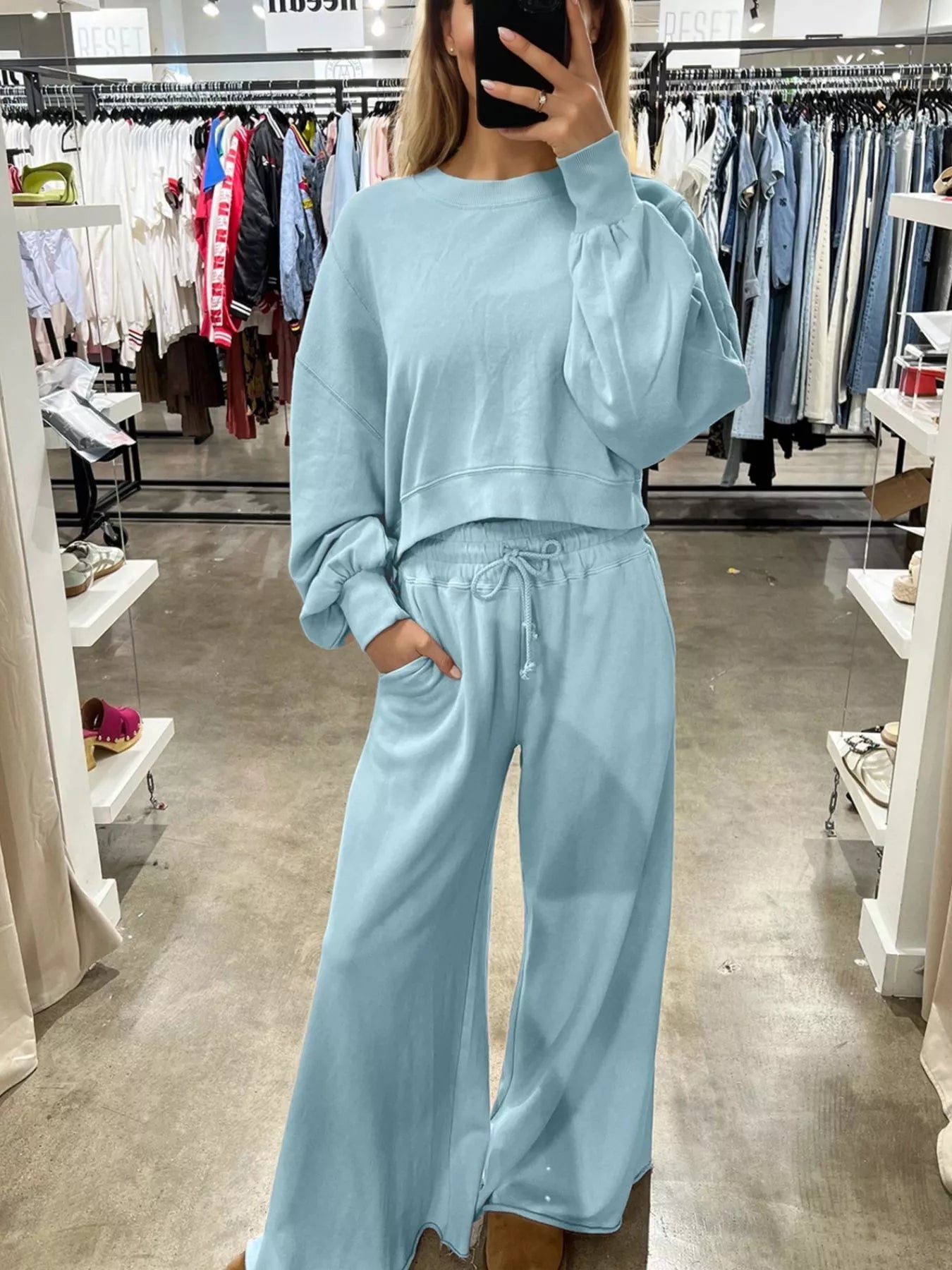 Green drop shoulder puff sleeve crop top with matching drawstring wide-leg pants set by Trendsi, stylish and comfortable ensemble.