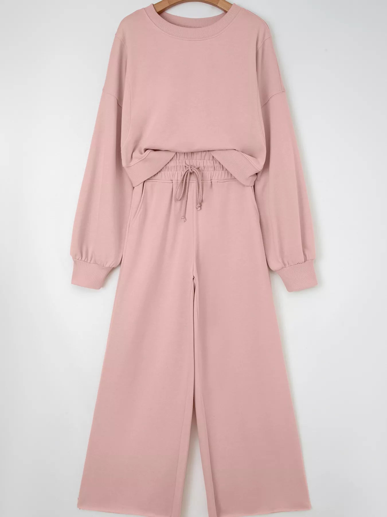 Green drop shoulder puff sleeve crop top and drawstring wide-leg pants set by Trendsi, casual chic outfit.