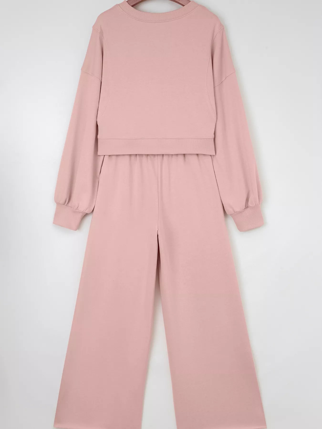 Green drop shoulder puff sleeve crop top and drawstring wide-leg pants set by Trendsi, casual and stylish outfit for warm weather.