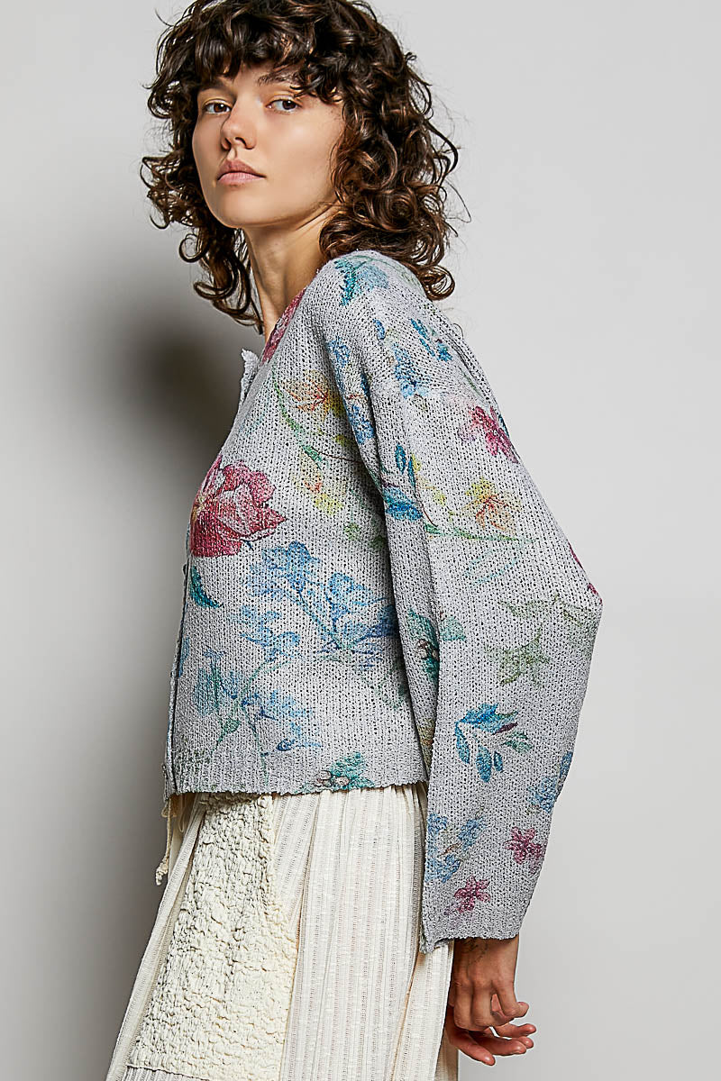 Heather grey floral print button-down knit cardigan by Trendsi, featuring a cozy, patterned design and front buttons.