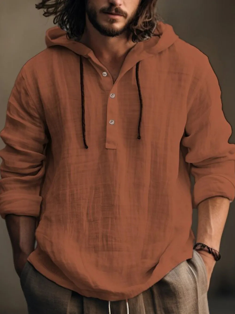 Men's ivory full-size long sleeve hoodie with half button front, made by Trendsi, shown in a close-up image.