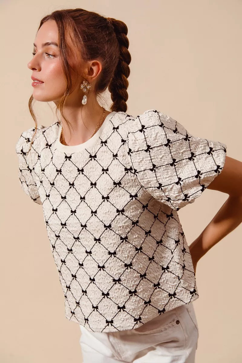 Ivory SO ME Bow Texture Woven Bubble Sleeve Top with puffed sleeves, stylish and lightweight for casual or dressy wear.