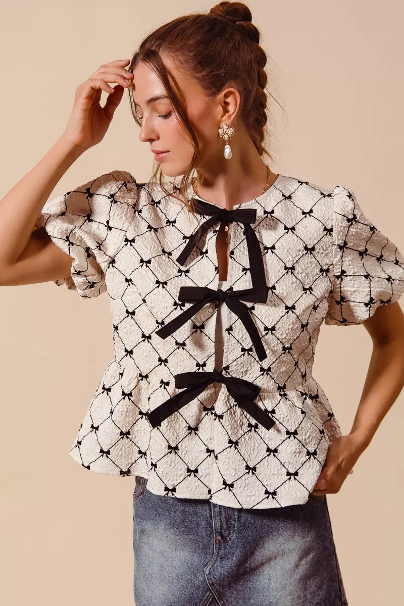 Ivory SO ME woven peplum top by Trendsi featuring bow texture, contrast tie, and stylish design.