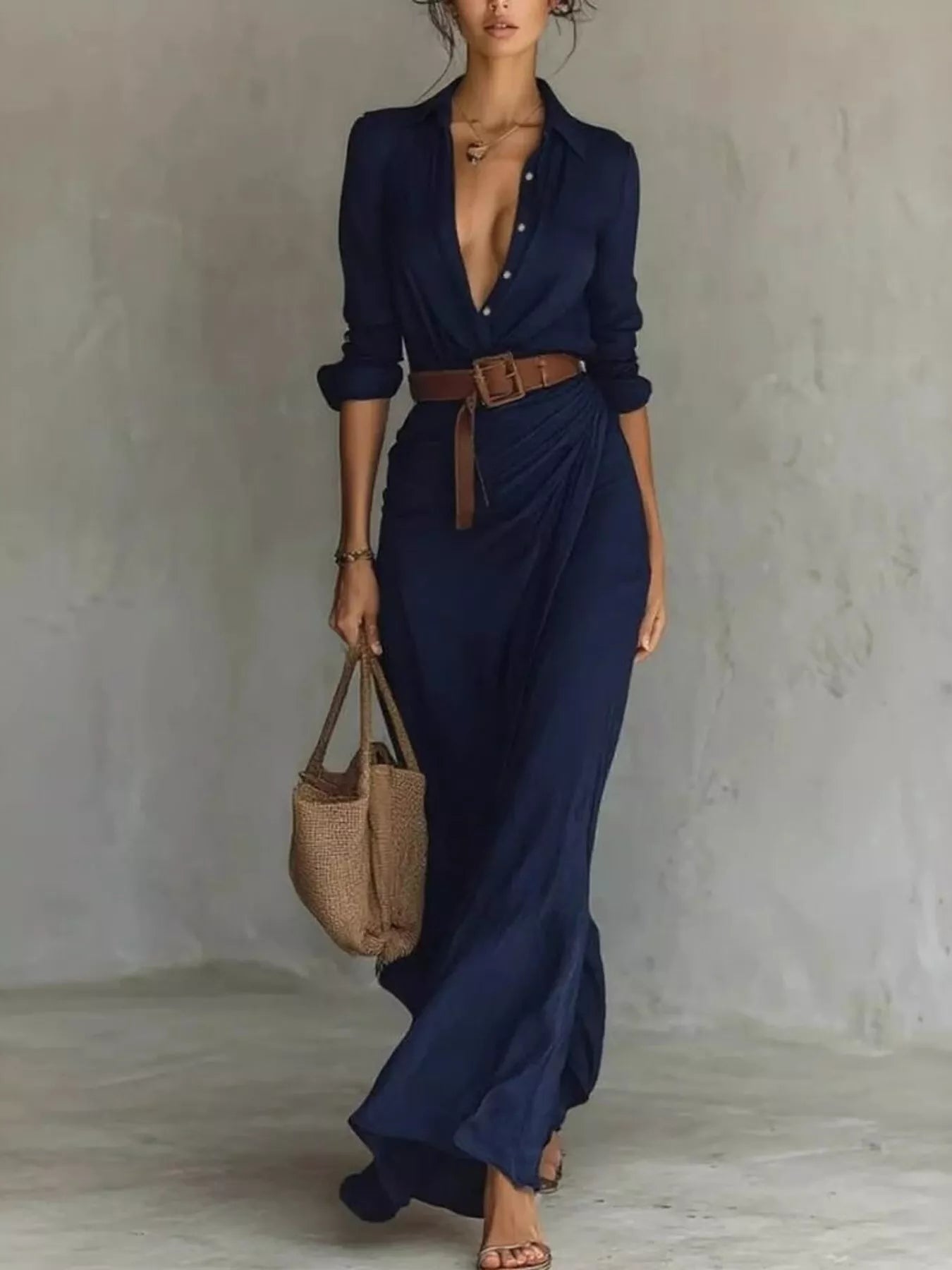 Khaki plus size full-length maxi dress with ruched long sleeves by Trendsi, styled for a comfortable, elegant look.