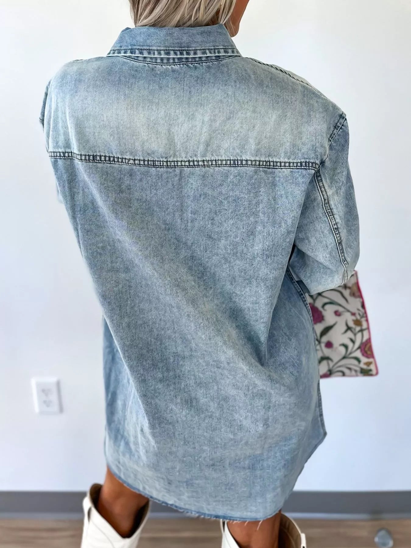 Light blue denim shirt dress with chest pocket and raw hem, loose fit, by Trendsi, shown on a model.