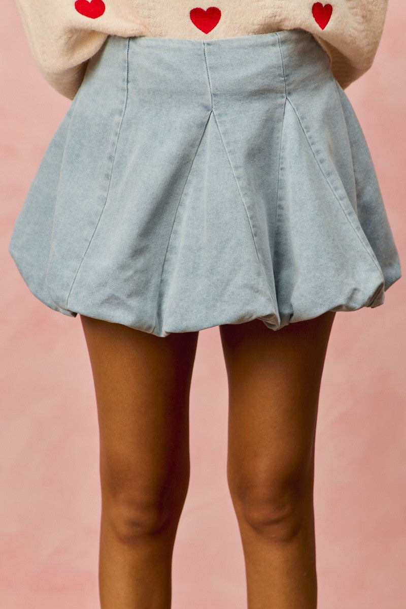 Light denim SO ME Bubble Mini Skirt from Trendsi, showing its high waist and playful bubble hem design.