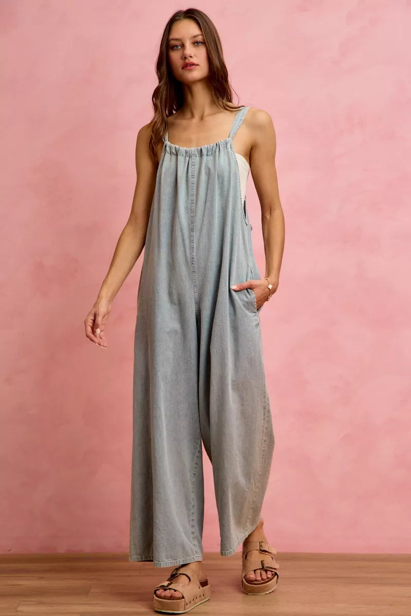 Light blue SO ME wide leg lightweight denim overalls from Trendsi, featuring a relaxed fit and casual style.