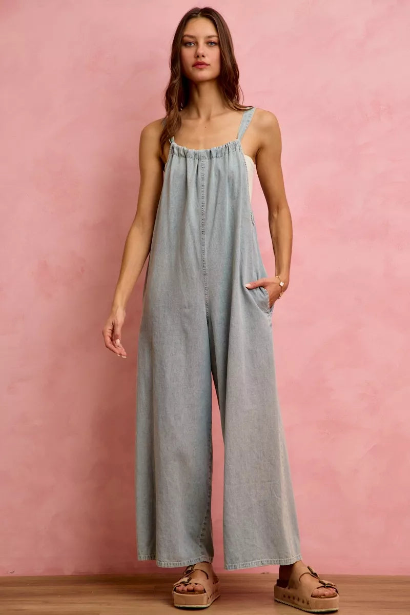 Light blue SO ME wide-leg lightweight denim overalls with adjustable straps and front pockets, styled for casual wear.