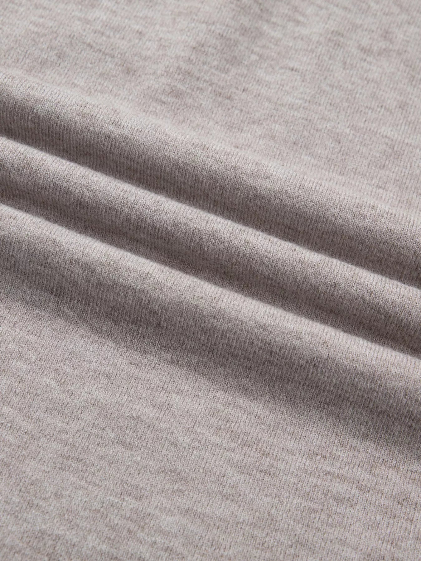 Mocha metal star detail V-neck sweater knit tank top by Trendsi, featuring a stylish V-neck and metallic star accents.