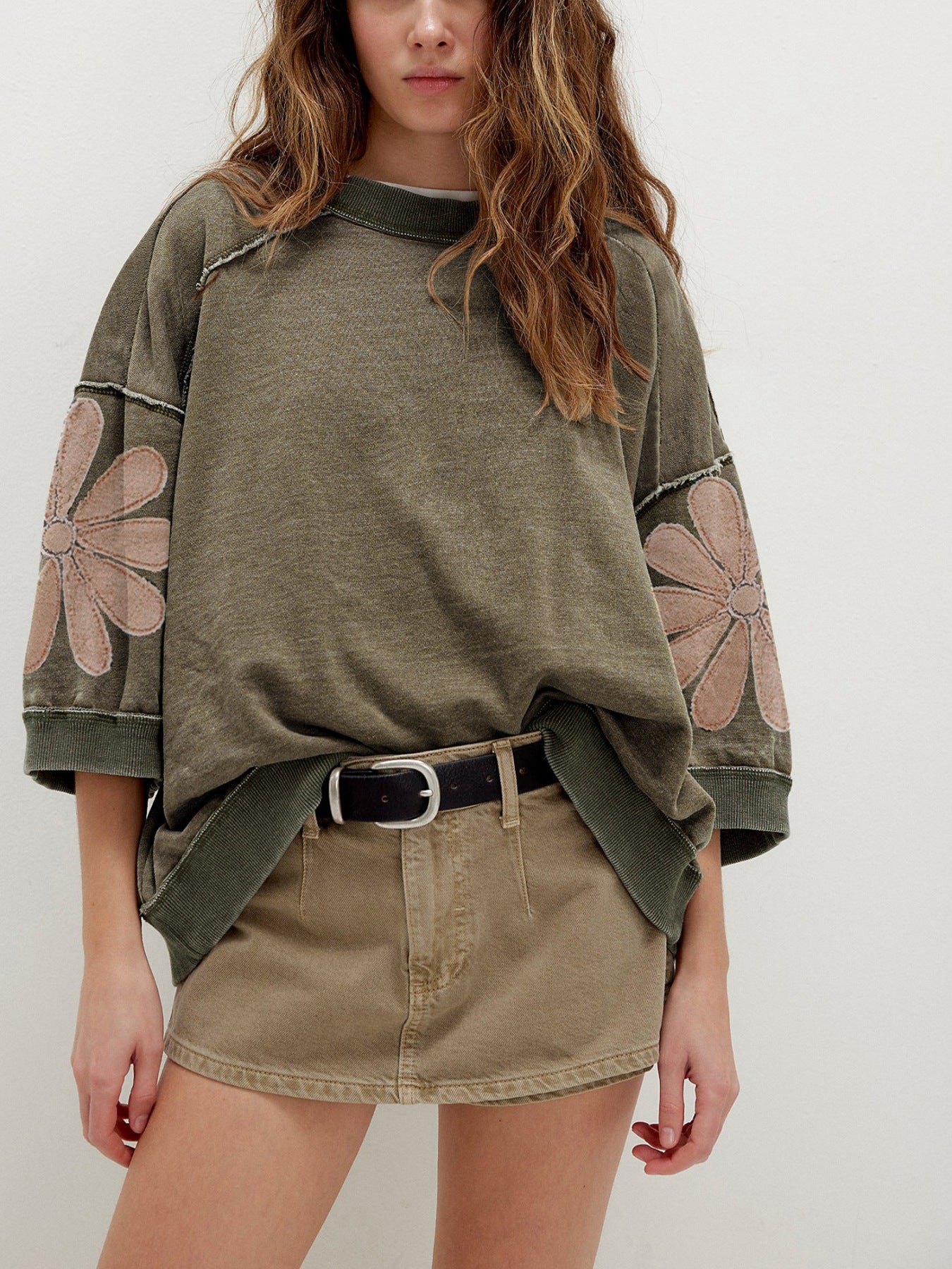 Trendsi mineral wash raw seam patchwork flower 3/4 sleeve loose top, casual women's patchwork blouse with floral design.