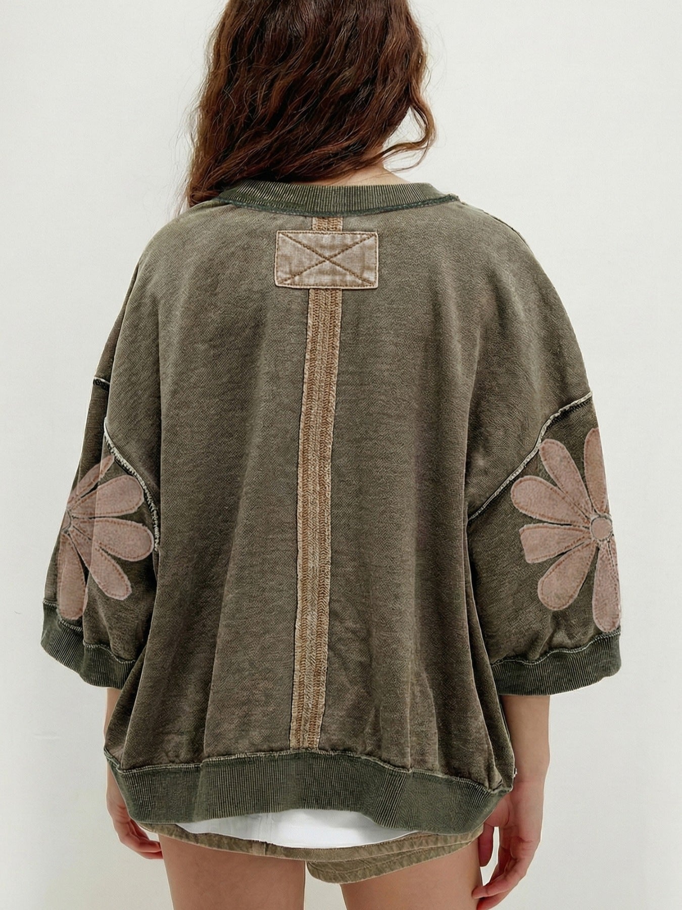 Mineral wash raw seam patchwork flower pattern loose 3/4 sleeve top by Trendsi, casual style with patchwork details.