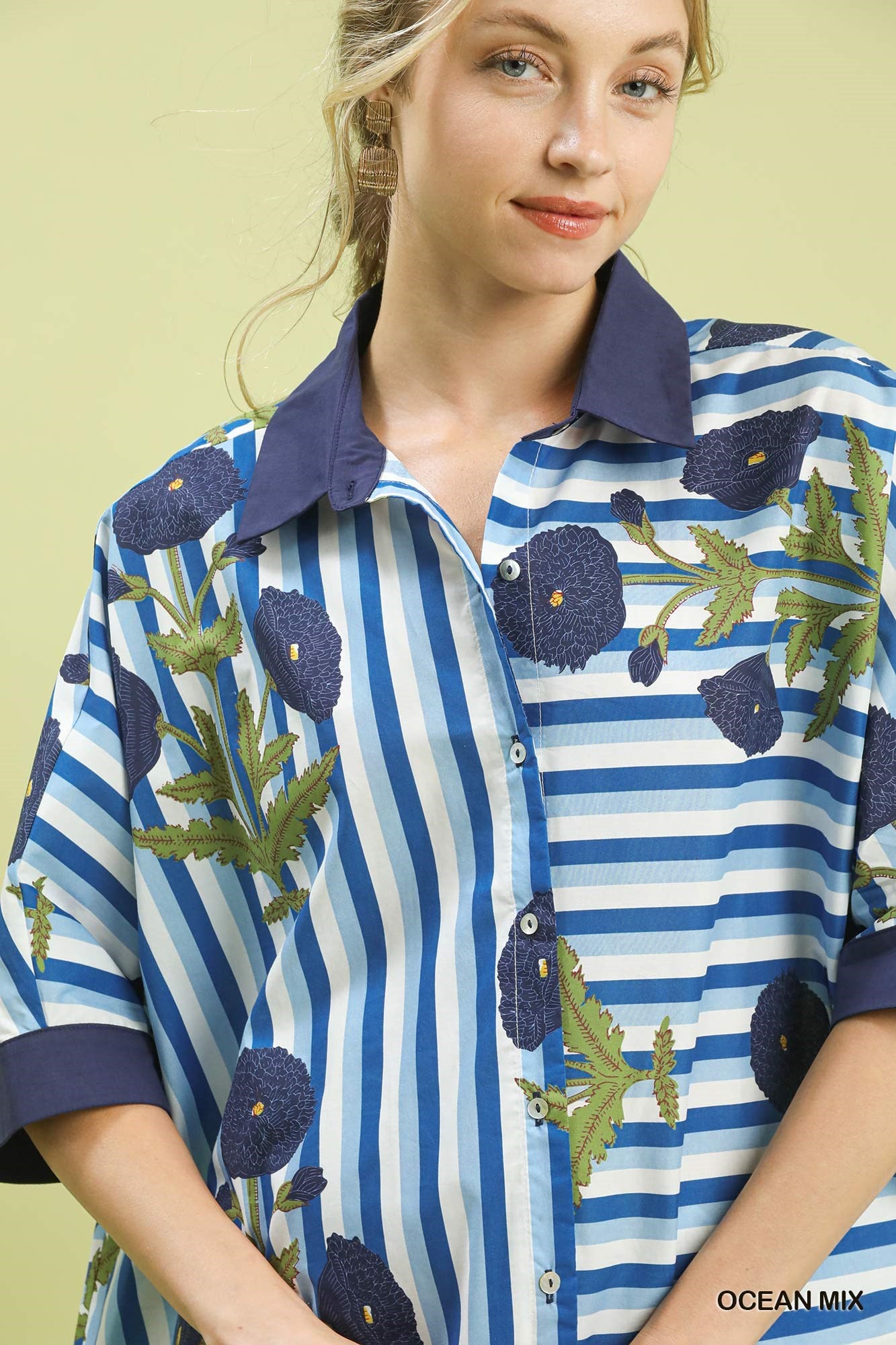 Ocean blue and white floral and stripe button-down top by Umgee, featuring a relaxed fit and stylish design.