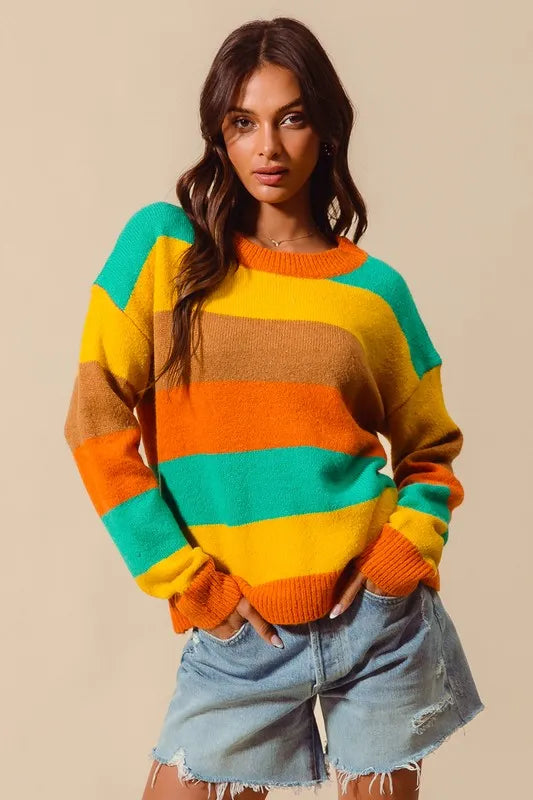 Multi-color stripe sweater with ribbed details from Trendsi, featuring a cozy, stylish design and vibrant color pattern.