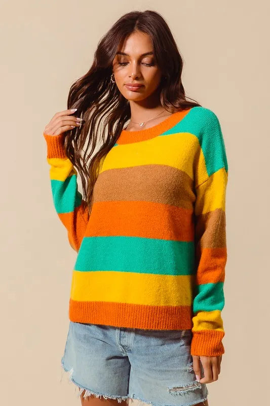 Multi-color striped sweater by Trendsi featuring ribbed detail, casual fit, and vibrant pattern in soft knit fabric.