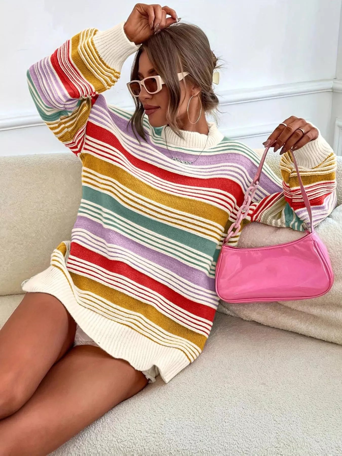 Yellow rainbow striped oversized sweater with drop shoulders from Trendsi, featuring bold colorful stripes and a relaxed fit.