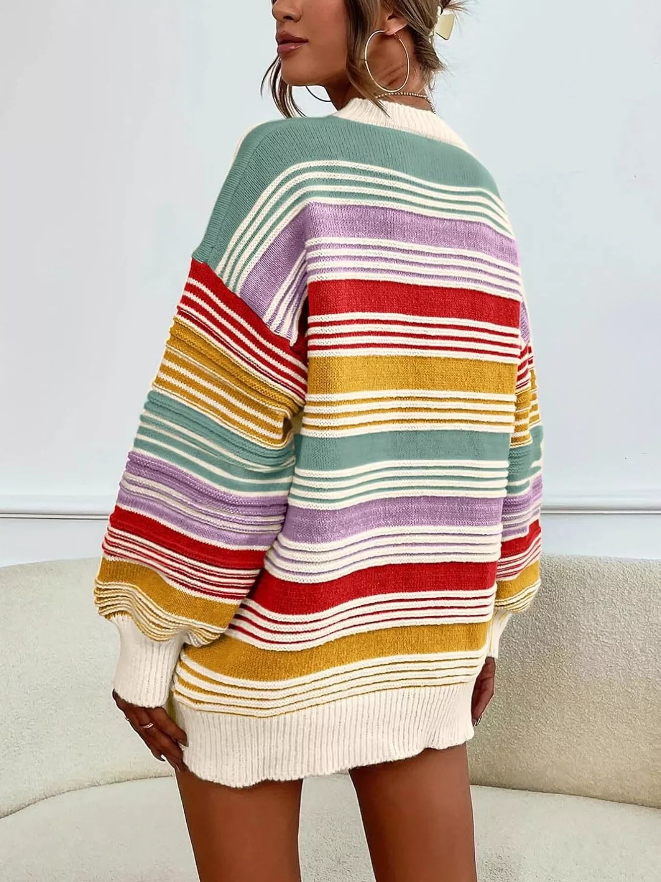 Yellow rainbow striped oversized sweater with drop shoulder design by Trendsi, featuring bold colorful stripes and a cozy fit.