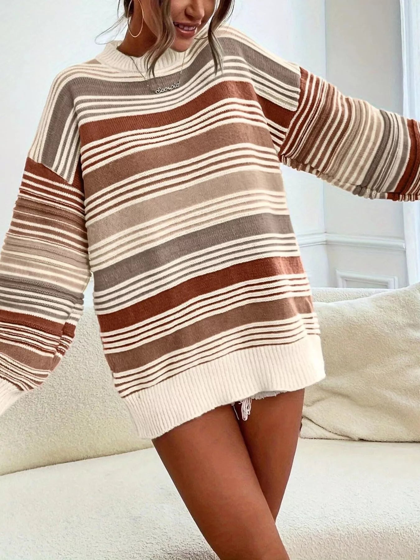 Yellow rainbow striped drop shoulder oversized sweater by Trendsi, featuring bold colorful horizontal stripes and a relaxed fit.