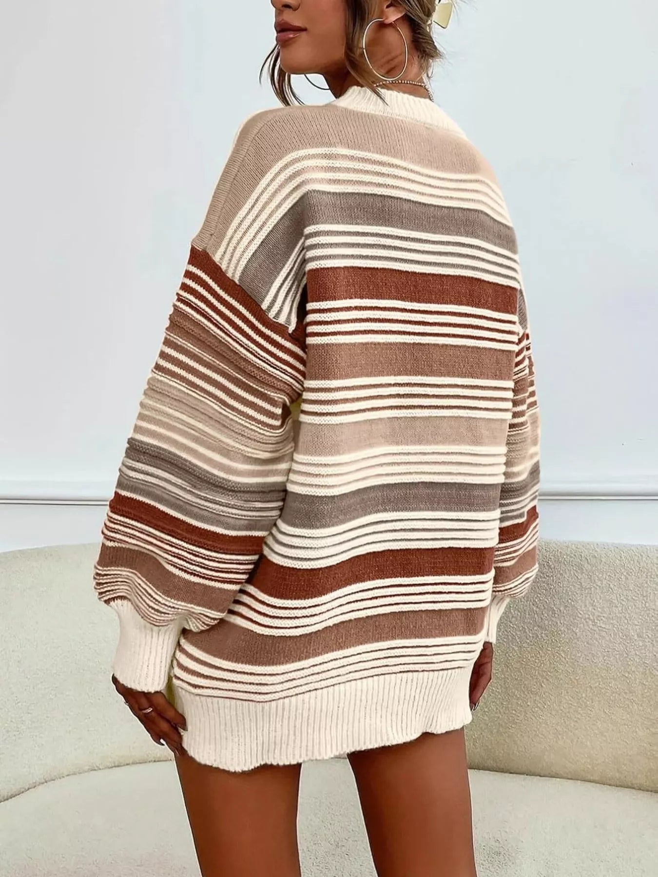 Yellow rainbow striped drop shoulder oversized sweater from Trendsi, featuring colorful horizontal stripes and a relaxed fit.